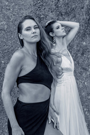 Two stunning models strike poses amid the rich tapestry and of beauty in nature.の写真素材
