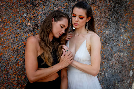 Two stunning models strike poses amid the rich tapestry and of beauty in nature.の写真素材