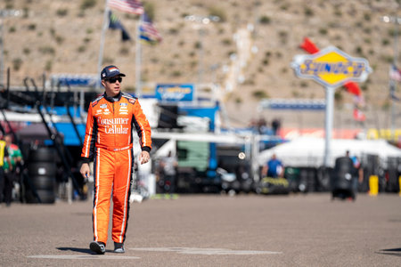 Brad Keselowski waits for practice to begin for the Shiners Children's 500 in Avondale, AZ, USA.
