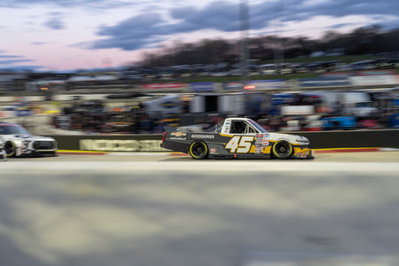 Kaden Honeycutt race for position for the Long John Silver's 200 in Martinsville, VA, USA.のeditorial素材