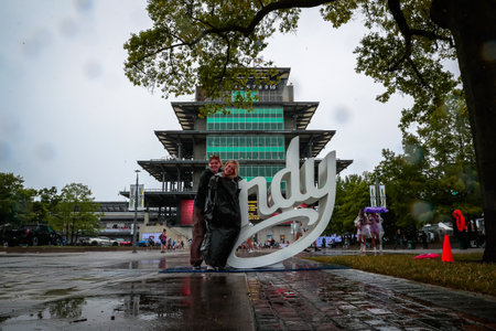 NTT INDYCAR SERIES Fans, hang around the garage during a rain delay for the 108th Running of the Indianapolis 500 at Indianapolis Motor Speedway in Speedway IN.のeditorial素材