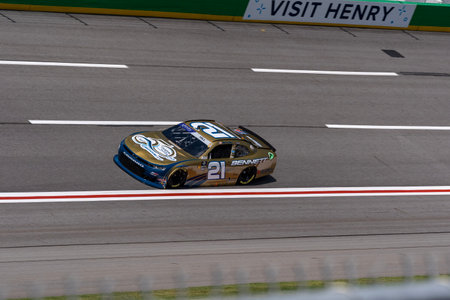 Sep 07, 2024-Hampton, GA;   AUSTIN HILL (21) runs through turn 2 on his qualifying lap for the Focused Health 250 at Atlanta Motor Speedway.のeditorial素材
