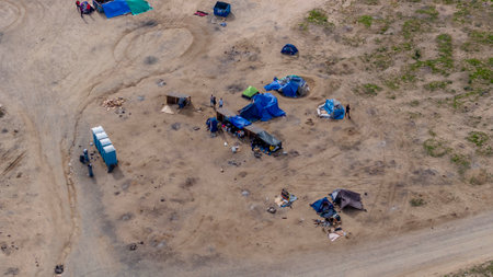 Makeshift campsite in Jacumba, California, harbors illegal immigrants, highlighting complex border issues and humanitarian challenges in the regionのeditorial素材