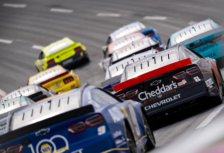 KYLE BUSCH (8) of Las Vegas, NV  races down the front stretch during the Ambetter Health 400 at the...