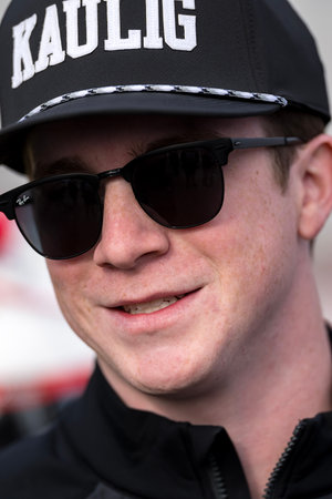 NASCAR Xfinity Series driver, DANIEL DYE (10) , stops for photographs with family and friends before...
