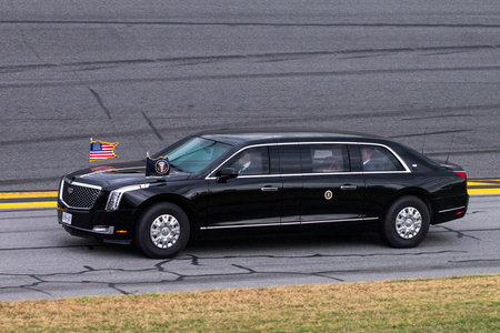 Donald Trump, 45th and 47th President of the United States, is driven around the track during the parade laps prior to the start of the Daytona 500 at the Daytona International Speedway in Daytona Beach FL.のeditorial素材