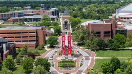 Aerial view of Shafer Tower at Ball State reveals a 150-ft carillon rising from University Green. A striking landmark with 48 bells, it chimes time and melodies across Muncieâs campus skyline.のeditorial素材