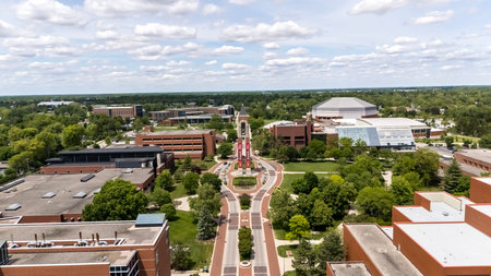 Aerial view of Shafer Tower at Ball State reveals a 150-ft carillon rising from University Green. A striking landmark with 48 bells, it chimes time and melodies across Muncieâs campus skyline.のeditorial素材