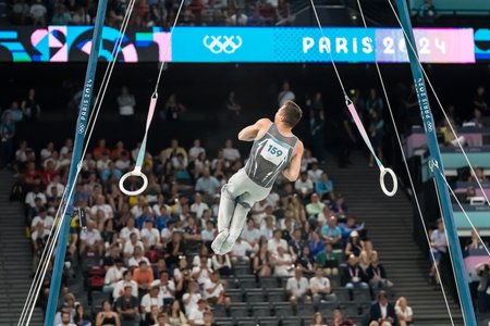 Milad Karimi (KAZ) of Kazakhstan, competes in the Men's All-Around Finals at the Stade de France...