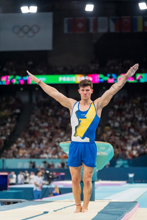 Illia Kovtun (UKR) of Ukraine, competes in the Men's All-Around Finals at the Stade de France Stadium during the 2024 Paris Summer Olympics in Paris, France.の写真素材