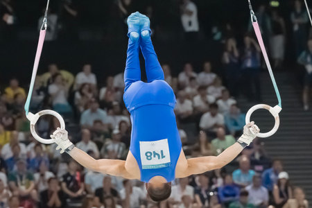 Yumin Abbadini (ITA) of Italy, competes in the Men's All-Around Finals at the Stade de France Stadium during the 2024 Paris Summer Olympics in Paris, France.のeditorial素材