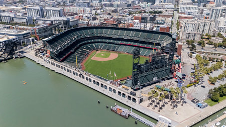 SAN FRANCISCO, CA USA - July 28, 2025:  An aerial view of Oracle Park reveals the stadium nestled along San Francisco Bay, with sweeping views of McCovey Cove and the city skyline framing the home of the Giants.のeditorial素材