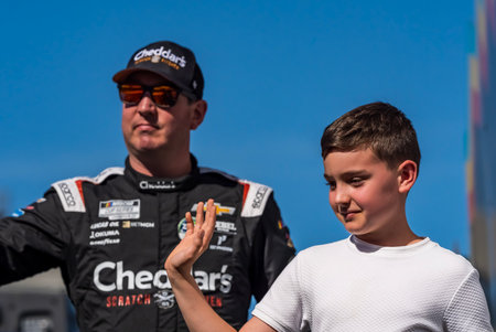AVONDALE, AZ USA - November 02, 2025:  NASCAR Cup Series driver, KYLE BUSCH (8) of Las Vegas, NV, is introduced to the fans before the NASCAR Cup Series Championship at Phoenix Raceway in AVONDALE, AZ, USA.のeditorial素材