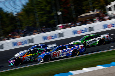 RYAN PREECE (60) of Berlin, CT races off turn four during the Mobil 1 301 in Loudon, NH.