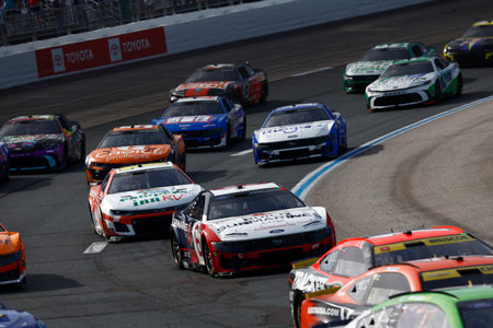 BRAD KESELOWSKI (6) of Rochester Hills, MI races off turn 4 during the Mobil 1 301 in Loudon, NH.