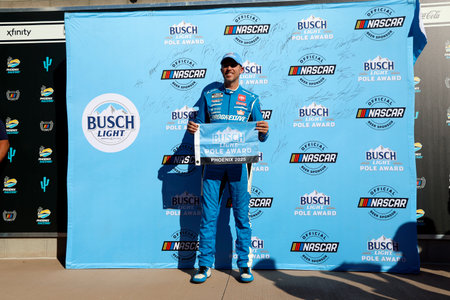 DENNY HAMLIN (11) of Chesterfield, VA wins the Busch Lite Pole award for the NASCAR Cup Series Championship in Avondale, AZ.のeditorial素材