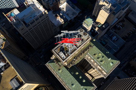 Aerial view captures Dallasâ iconic red Pegasus atop the historic Magnolia Building, a glowing symbol of the cityâs strength, history, and enduring legacy visible for miles across the skyline.のeditorial素材