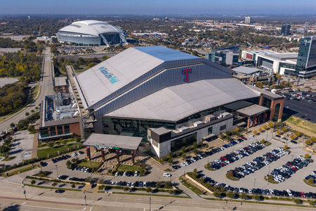 An aerial view reveals Globe Life Fieldâs sleek retractable roof and modern design in Arlington, rising beside its predecessor as the home of the Texas Rangers.のeditorial素材