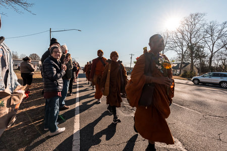 A group of about two dozen Buddhist monks continues their long journey toward the U.S. capital,...