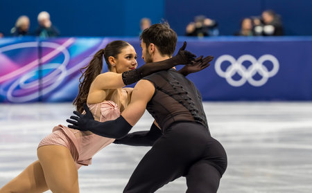 LAURENCE FOURNIER BEAUDRY and GUILLAUME CIZERON of France perform during the Team Event - Ice Dance - Rhythm Dance competition at the Milano Ice Skating Arena for the Milano Cortina 2026 Winter Olympics in Milan, Italy.のeditorial素材