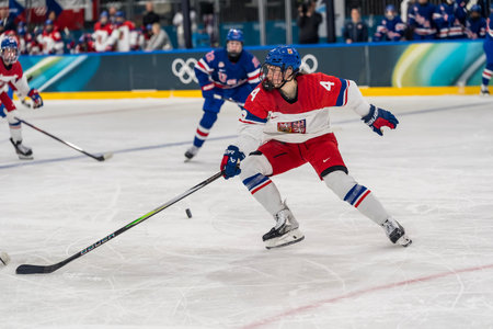 defender Daniela Pejsova #4 of Team Czechia plays against Team USA in the Preliminary Round Group B at the Milano Ice Park In Rho in MILAN, Italy during the 2026 Milano Cortina Winter Olympics.  Team USA wins 5-1.のeditorial素材