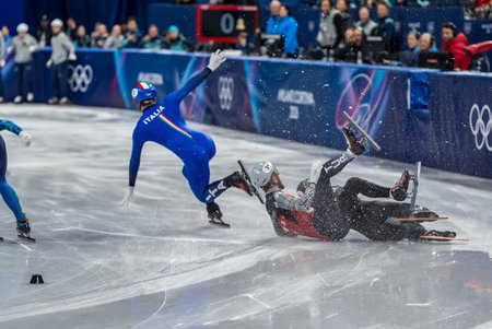 Furkan Akar #31 of TÃ¼rkiye races during the Short Track Speed Skating Mens 500m Heats at the Milano Ice Skating Arena in MILAN, Italy during the 2026 Milano Cortina Winter Olympics.のeditorial素材