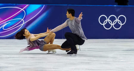 Emily Chan and Spencer Akira Howe of the United States perform during the Figure Skating Pair Skating Free Skating Finals at the Milano Ice Skating Arena during the 2026 Milano Cortina Winter Olympics in Milan, Italy.のeditorial素材