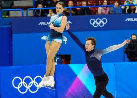 Maria Pavlova and Alexei Sviatchenko of Hungary perform during the Figure Skating Pair Skating Free Skating Finals at the Milano Ice Skating Arena during the 2026 Milano Cortina Winter Olympics in Milan, Italy.のeditorial素材