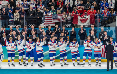 Team USA stands for the national anthem after defeating Team Canada 2:1 in overtime for the Mens...