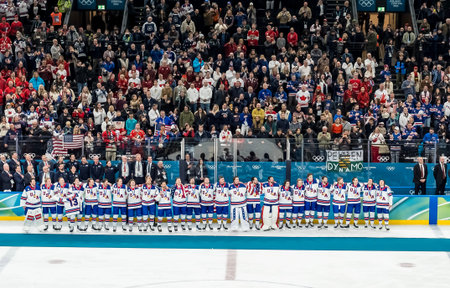 Team USA stands for the national anthem after defeating Team Canada 2:1 in overtime for the Mens...