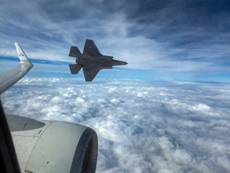 An F-35 escorts a KLM flight carrying Team Netherlands home from the Milano Cortina 2026 Winter...