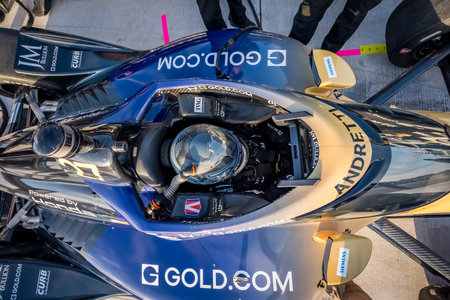 NTT INDYCAR SERIES driver, KYLE KIRKWOOD (27) (USA) of Jupiter, FL, straps into the cockpit before...