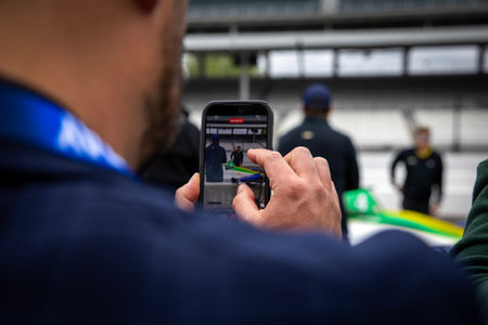 NTT INDYCAR SERIES driver, CAIO COLLET (R) (4) (BRA) of Sao Paulo, Brazil, comes off pit road during a practice for the Indianapolis 500 at Indianapolis Motor Speedway in SPEEDWAY Indiana.