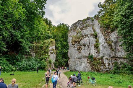 OJCOW, POLAND - AUGUST 13, 2017: Tourists at the Cracow Gate in the Ojcowski National Park, Poland.のeditorial素材