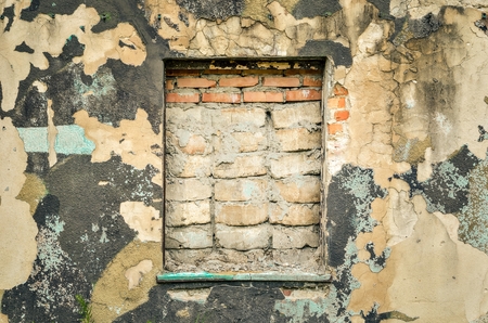 Creative wall background. Walled window and old ruined wall.