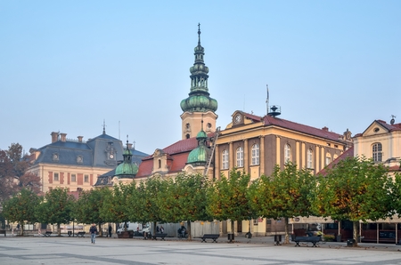 PSZCZYNA, POLAND - OCTOBER 19, 2017: Town hall and church on the beautiful historic market in Pszczyna, Poland.のeditorial素材