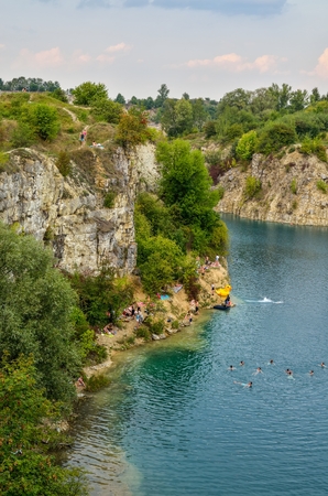 KRAKOW, POLAND - AUGUST 27, 2017: People on the beach on the Zakrzowek lagoon in Krakow, Poland.のeditorial素材