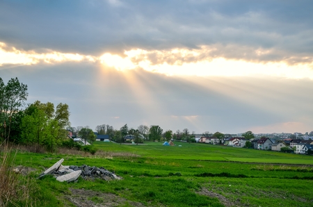 Afternoon rural landscape. Interesting atmospheric phenomenon in the sky.の写真素材
