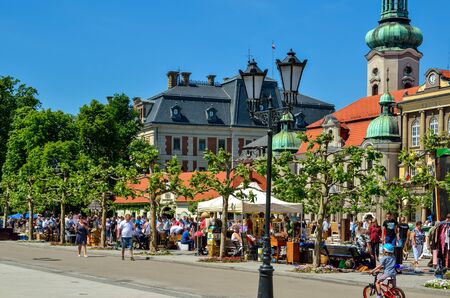 PSZCZYNA, POLAND - MAY 13, 2018: Antique market on a beautiful historic market in Pszczyna, Poland.のeditorial素材