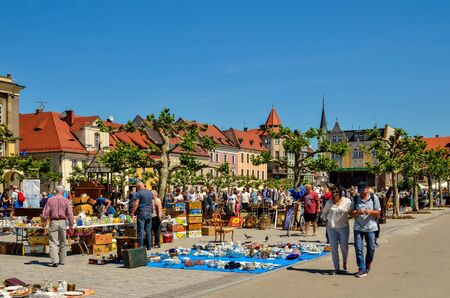 PSZCZYNA, POLAND - MAY 13, 2018: Antique market on a beautiful historic market in Pszczyna, Poland.のeditorial素材
