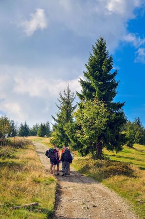 BESKIDS, POLAND - SEPTEMBER 9, 2018: Tourists on the mountain trail in the Beskids in Poland.のeditorial素材