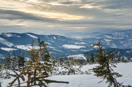 Beautiful winter mountain landscape. Magical snow-covered slopes in the Polish mountains.の写真素材