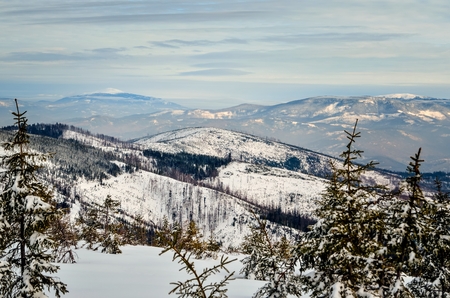 Beautiful winter mountain landscape. Magical snow-covered slopes in the Polish mountains.の写真素材
