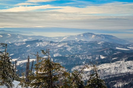 Beautiful winter mountain landscape. Magical snow-covered slopes in the Polish mountains.の写真素材
