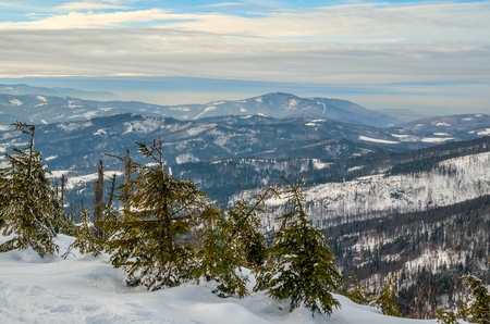 Beautiful winter mountain landscape. Magical snow-covered slopes in the Polish mountains.の写真素材