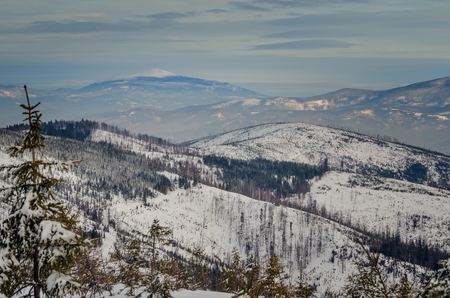 Beautiful winter mountain landscape. Magical snow-covered slopes in the Polish mountains.の写真素材