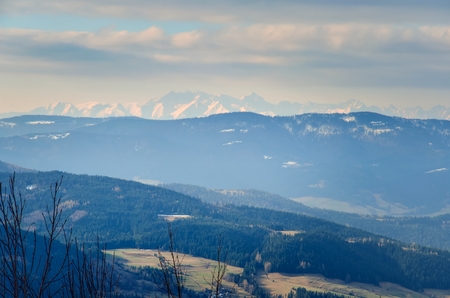 Beautiful spring mountain landscape. A rural view of the Polish Tatras and valleys from the surrounding mountains.の写真素材