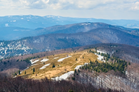 Beautiful spring mountain landscape. Fabulous view of the hills and valleys in Poland.の写真素材