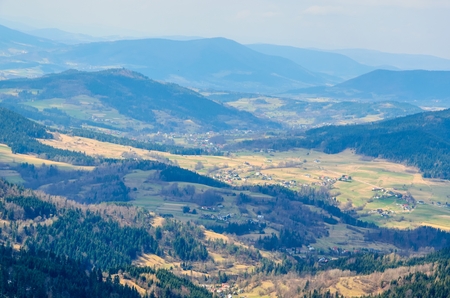 Beautiful spring mountain landscape. Fabulous view of the hills and valleys in Poland.の写真素材
