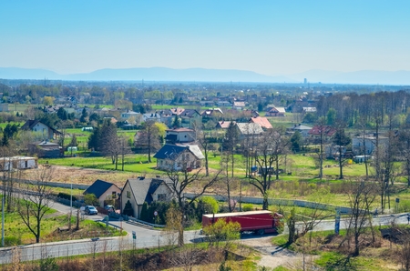 Spring urban landscape. Houses in the countryside in Poland.の写真素材